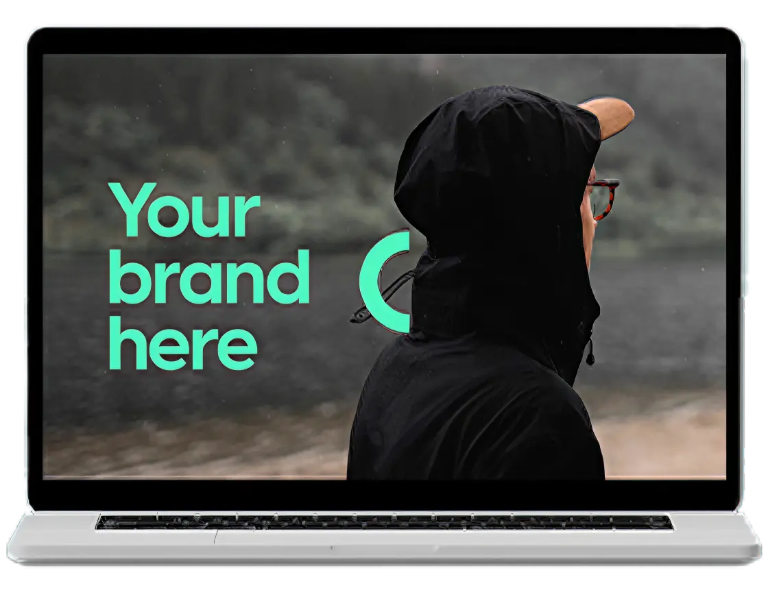 Laptop med bild p&aring; person i svart hoodie och texten &rdquo;Your brand here&rdquo;